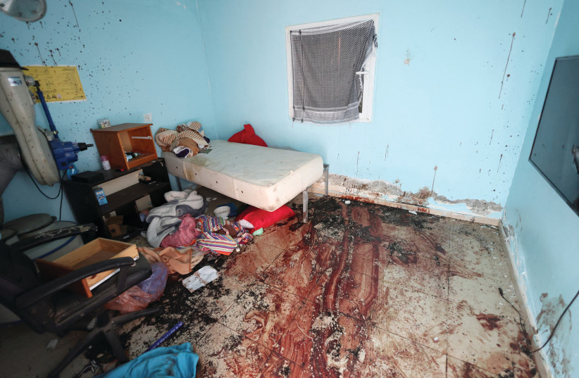  A BLOODSTAINED room in Kibbutz Nir Oz after the October 7 massacre carried out by Hamas: In the age of mass disinformation, the terrible truths of what occurred on October 7 must be repeatedly shared. (credit: RONEN ZVULUN/REUTERS)