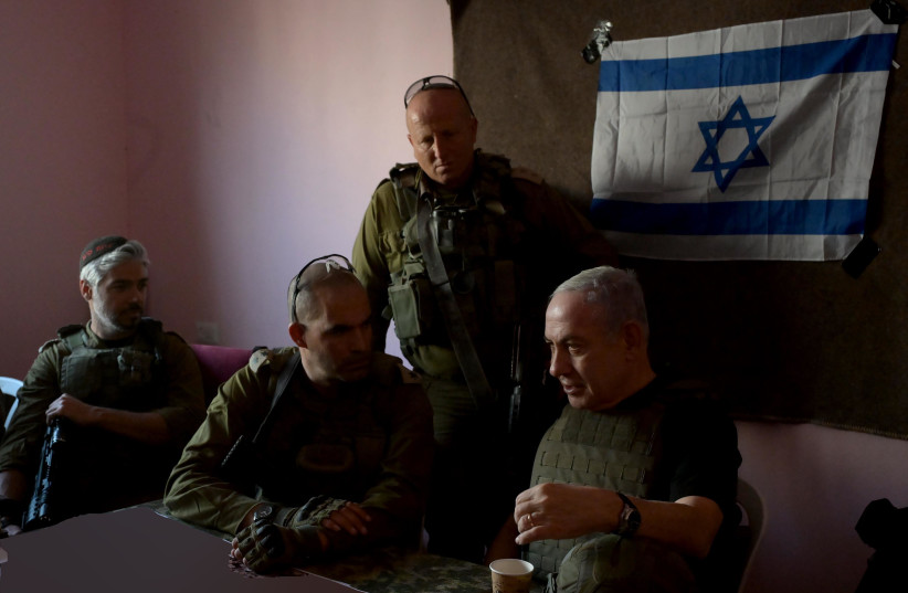  Prime Minister Benjamin Netanyahu seen with Israeli forces in the Gaza Strip on Sunday, November 25, 2023 (credit: GPO/AVI OHAYON)
