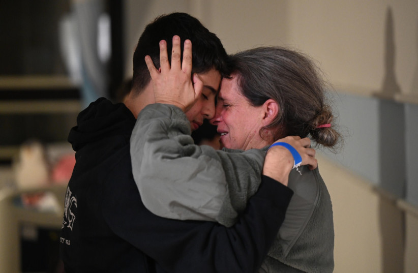 Members of the Avigdori family reunite at Sheba Hospital after over a month of separation, November 26, 2023.