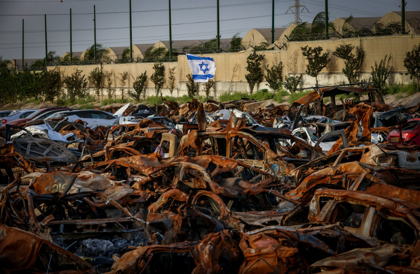 View of cars destroyed by Hamas terrorists during the October 7 massacre, at a field near the Israel-Gaza border, November 26, 2023 (credit: YOSSI ZAMIR/FLASH90)