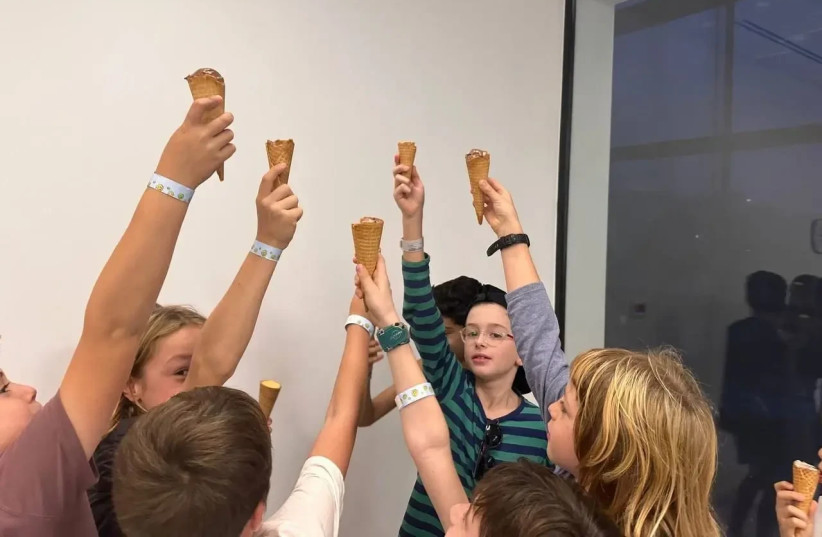  innocence of children. Ohad Monder and his friends eat ice cream at a meeting after his return (credit: SCREENSHOT ACCORDING TO 27A OF COPYRIGHT ACT, SOCIAL MEDIA)