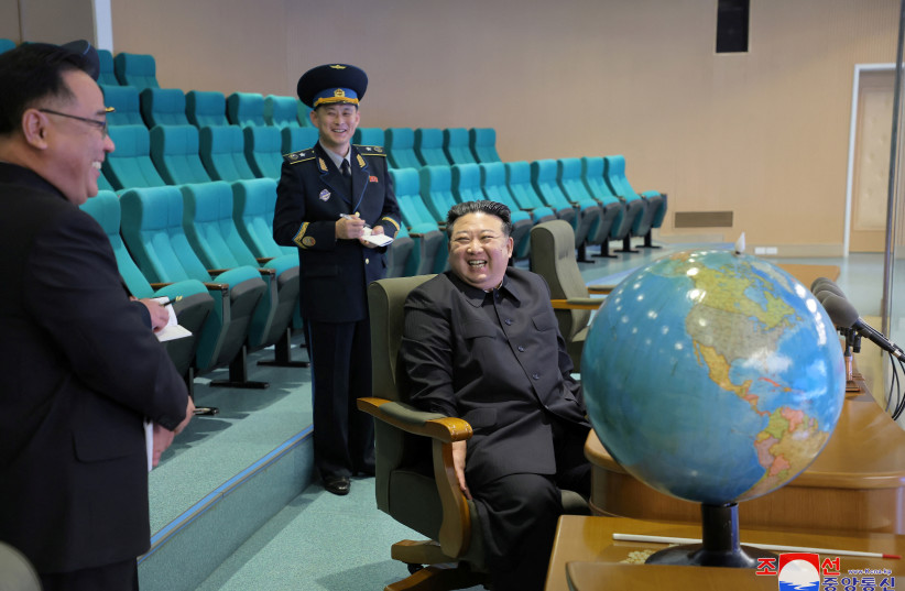  North Korea's leader Kim Jong-un visits the Pyongyang General Control Centre of the National Aerospace Technology Administration to inspect operational readiness of the reconnaissance satellites and view aerospace photographs, in this picture released by the Korean Central News Agency, November 2 (credit: KCNA VIA REUTERS)