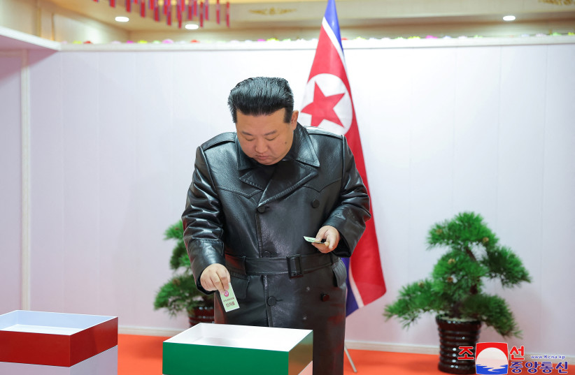  North Korea's leader Kim Jong-un casts his ballot during a local election, in South Hamgyong Province, North Korea, in this picture released on November 27, 2023 (credit: KCNA VIA REUTERS)