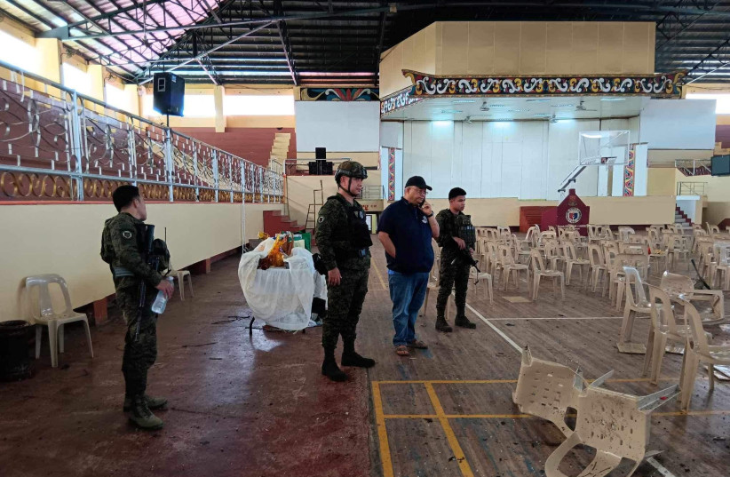  Lanao Del Sur Governor Mamintal Adiong Jr. looks on as law enforcement officers investigate the scene of an explosion that occurred during a Catholic Mass in a gymnasium at Mindanao State University in Marawi, Philippines, December 3, 2023. (credit: Lanao Del Sur Provincial Government/Handout via REUTERS)