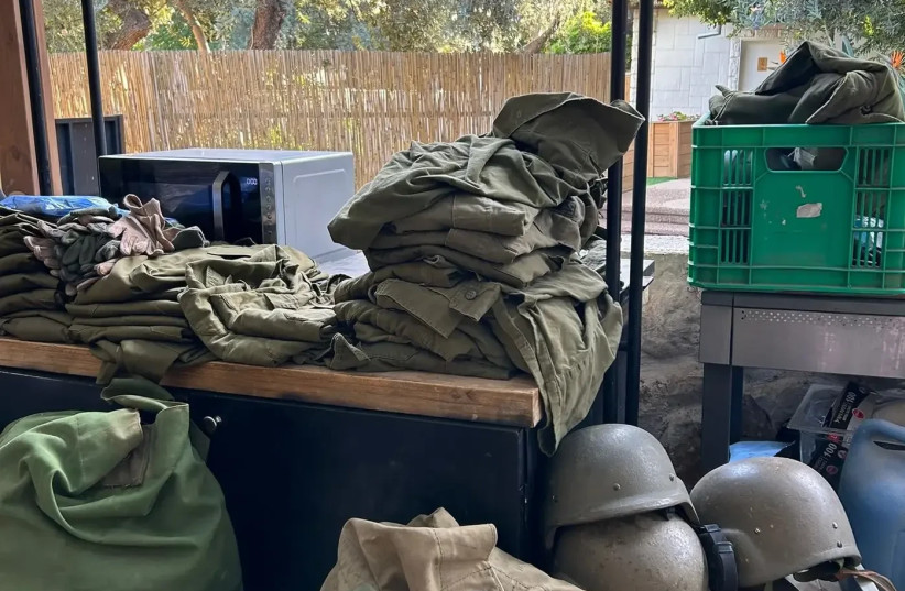  Instead of hosting vacationers, we decided to host soldiers who serve in the area.'' Soldiers' equipment in Olia (credit: Olia)
