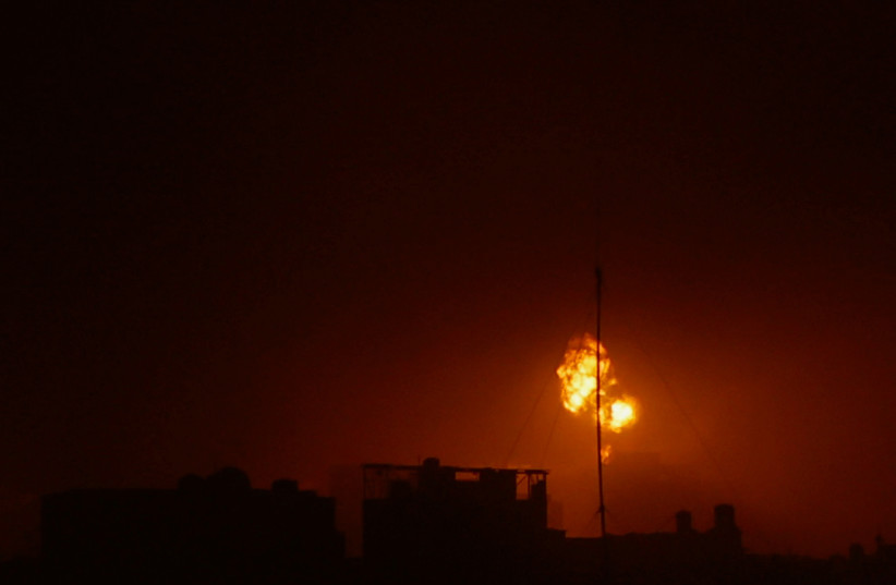  An explosion takes place during Israeli airstrikes over Gaza, amid the ongoing war between Israel and Hamas, in Khan Yunis in the southern Gaza Strip, December 4, 2023. (credit: IBRAHEEM ABU MUSTAFA/REUTERS)
