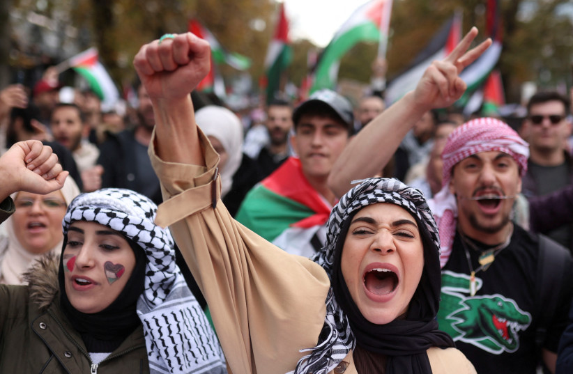  Demonstrators protest in solidarity with Palestinians in Gaza, amid the ongoing conflict between Israel and the Palestinian Islamist group Hamas, in Duesseldorf, Germany, October 21, 2023 (credit: REUTERS/THILO SCHMUELGEN)