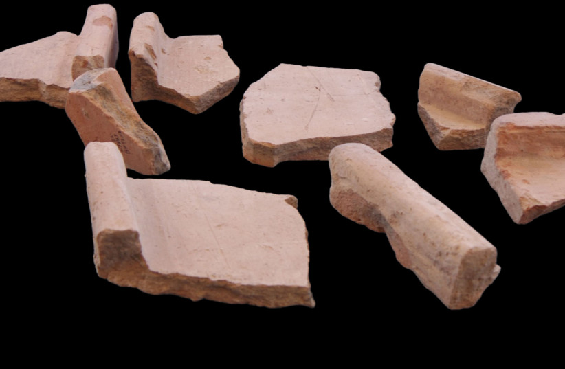  Rooftile fragments discovered at the Giv‘ati Parking Lot Excavation. (credit: EMIL ALADJEM/IAA)