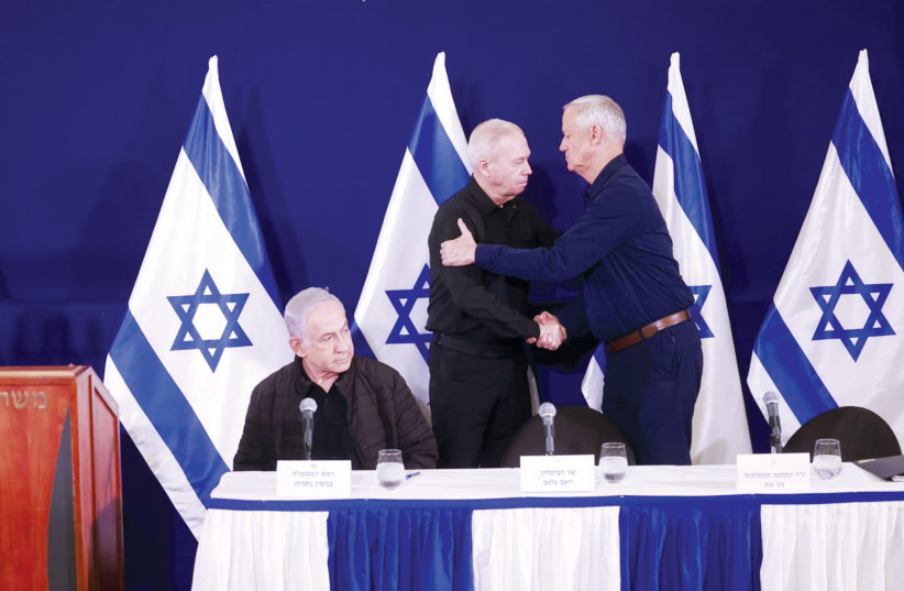  Prime Minister Benjamin Netanyahu, Defense Minister Yoav Gallant and Minsiter Benny Gantz at a press conference. (credit: MARC ISRAEL SELLEM)