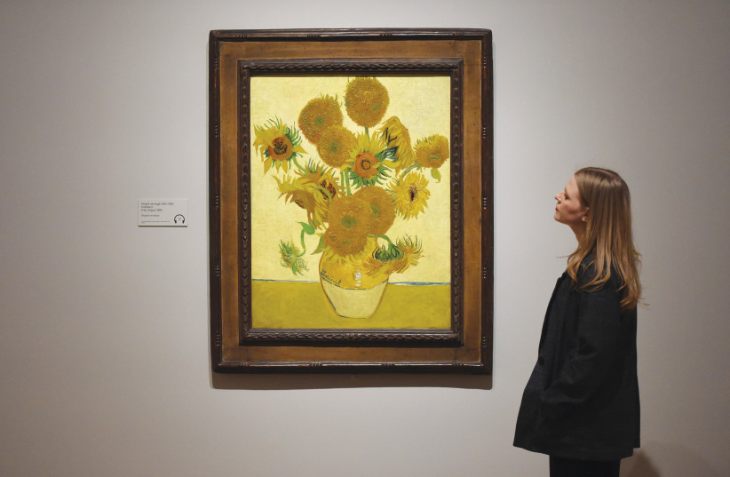  PONDERING VINCENT VAN GOGH’S ‘Sunflowers’ at the Tate Britain in London. (credit: Stuart C. Wilson/Getty Images)