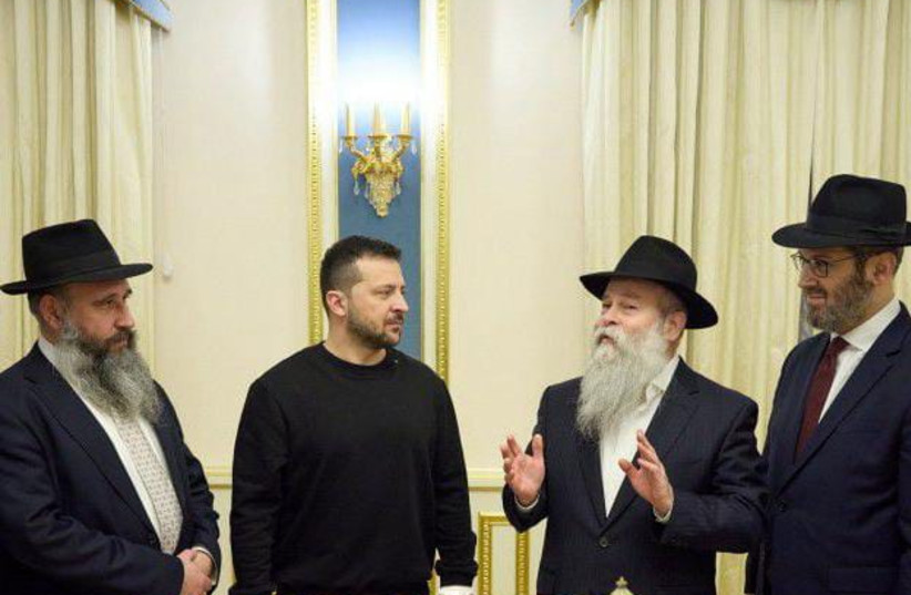  Ukrainian President Volodymyr Zelensky with Ukrainian rabbis on the first night of Hanukkah. December 7, 2023. (credit: President's office of Ukraine)