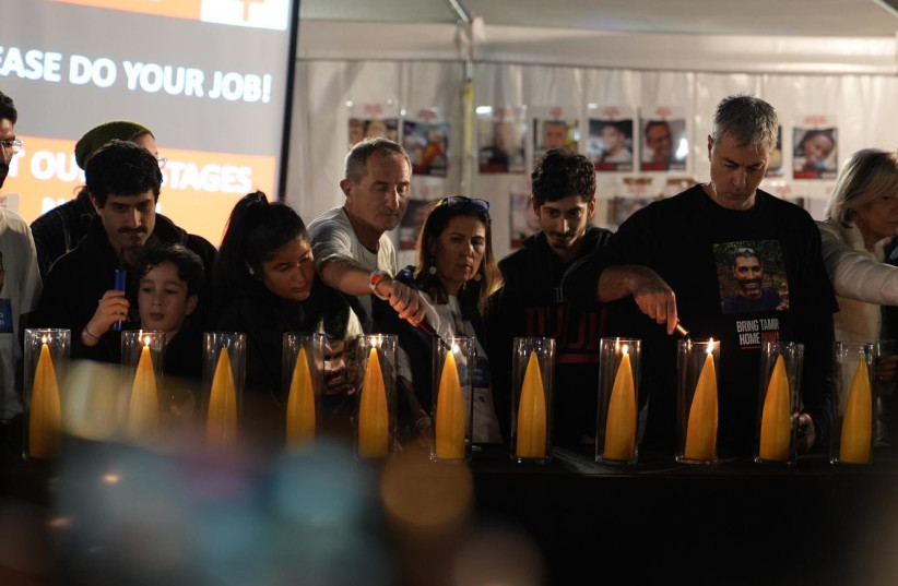 Families of hostages light special menorah in honor of 138 still captive (credit: Hostages and Missing Families Forum)