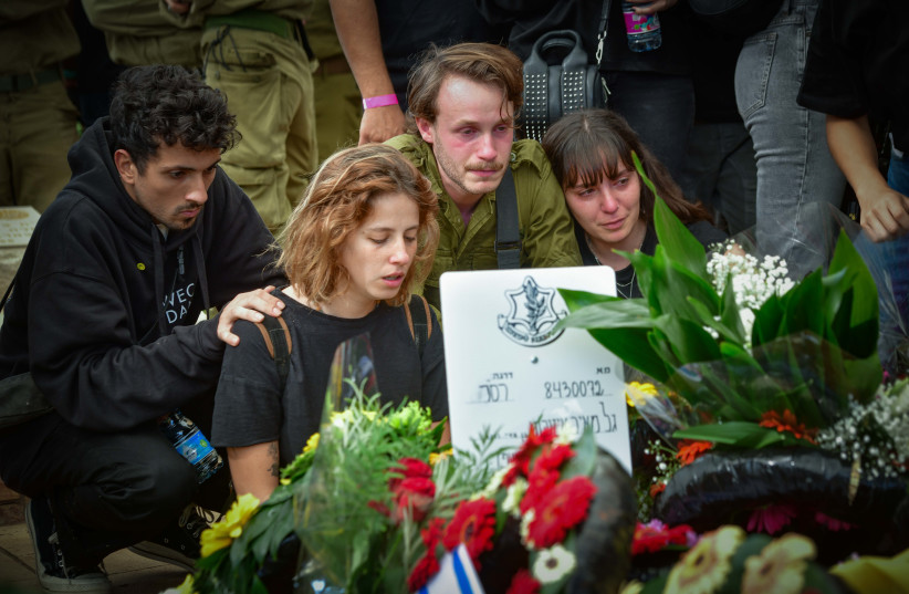 Family, friends and officials attend the funeral of Master Sgt. (res.) Gal Meir Eisenkot, son of war cabinet minister Gadi Eisenkot in Herzliya on December 8, 2023 (credit: AVSHALOM SASSONI/FLASH90)