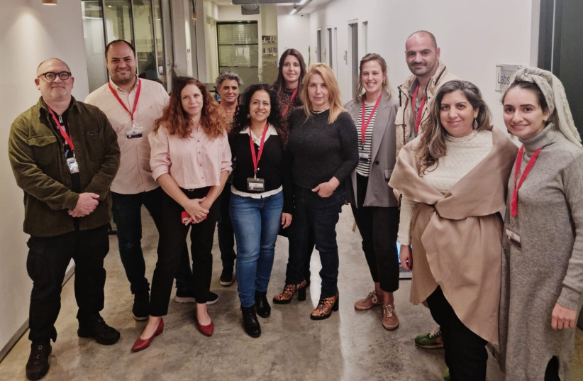  Eran Yomtovyan (second from left), the director of the Schreiber LevTech Entrepreneurship Center at JCT, poses with heads of the other various initiatives and educational institutions behind the hackathon at the Margalit Start-Up City in Jerusalem (credit: JCT)