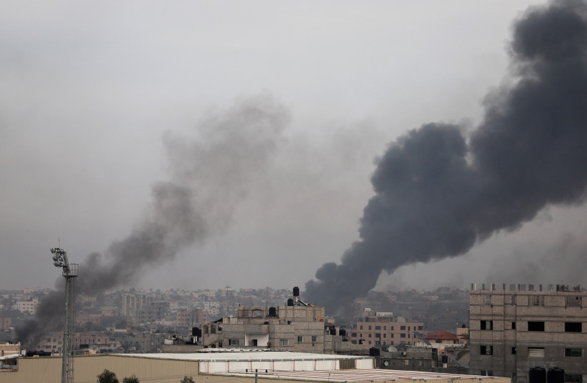  Smoke rises after Israeli strikes, amid the ongoing conflict between Israel Hamas, in Khan Younis in the southern Gaza Strip, December 10, 2023. (credit:  REUTERS/Ibraheem Abu Mustafa)