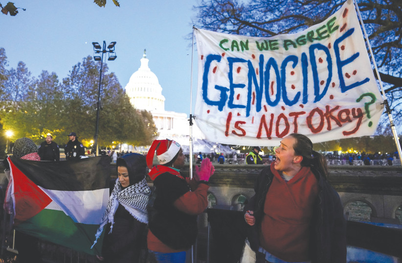  PALESTINIAN SUPPORTERS protest outside the US Capitol last month.  (credit: Elizabeth Frantz/Reuters)