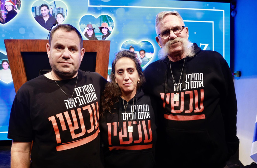  Ofir Engel's parent's and grandfather at a Hanukkah event for the families of the kidnapped, December 11, 2023. (credit: MARC ISRAEL SELLEM)