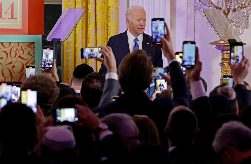  US President Joe Biden delivers remarks during a Hanukkah holiday reception in the East Room of the White House on December 11, 2023 in Washington, DC, US. (credit: CHIP SOMODEVILLA/POOL VIA REUTERS)