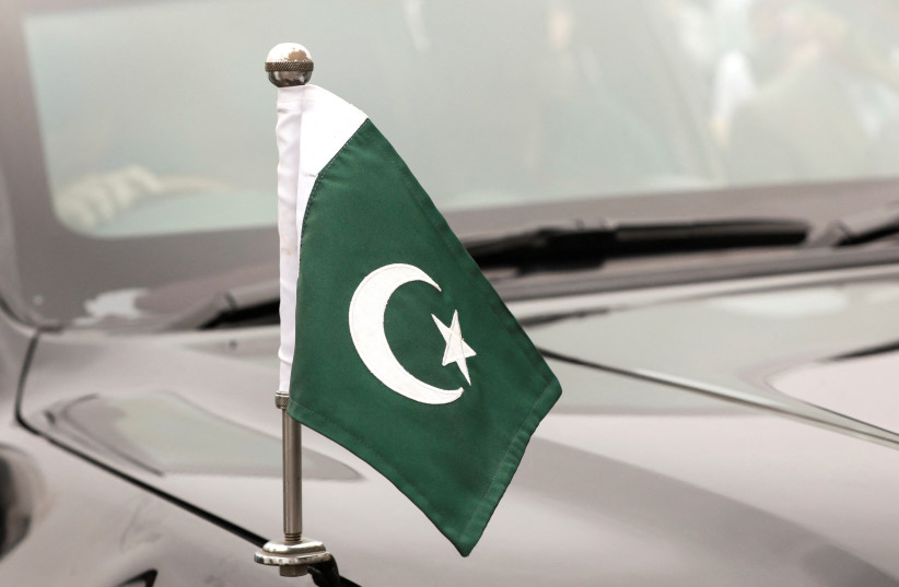  Pakistan's national flag is mounted on a vehicle of the Chief Minister of Sindh, as a convoy of vehicles is parked during a ceremony to celebrate Independence Day, in Karachi, Pakistan August 14, 2023 (credit: REUTERS/AKHTAR SOOMRO)