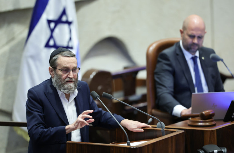  MK Moshe Gafni adresses the Israeli parliament during a discussion and a vote on the state budget at the assembly hall of the Israeli parliament in Jerusalem, December, 2023 (credit: YONATAN SINDEL/FLASH90)