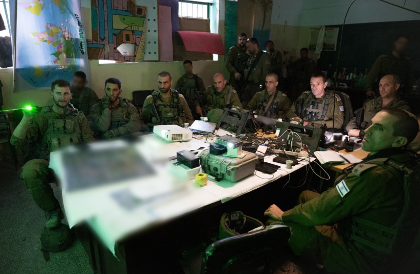  Herzi Halevi conducts a situational assessment in Shejaia with the Commander of the 36th Division and the Commander of the Golani Brigade. December 14, 2023. (credit: IDF)