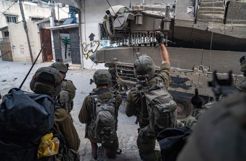  IDF soldiers operate in the Gaza Strip on December 15, 2023 (credit: IDF SPOKESPERSON'S UNIT)