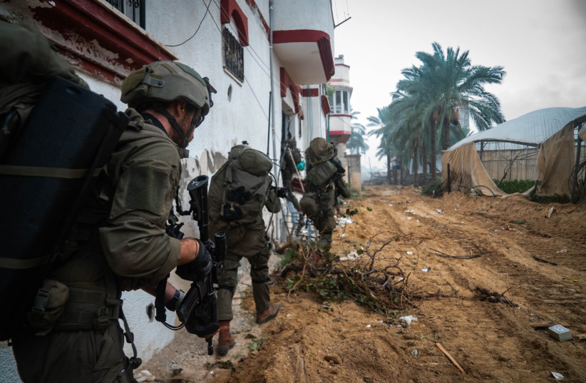   IDF and Shin Bet forces operate in Khan Yunis neighborhood where Hamas leader, Yahya Sinwar, lived in recent years. December 15, 2023. (credit: IDF)