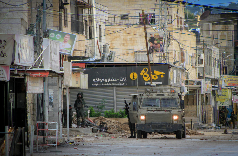  A counter terrorism raid by the Israeli army, in the West Bank city of Jenin, December 13, 2023.  (credit:  Nasser Ishtayeh/Flash90)