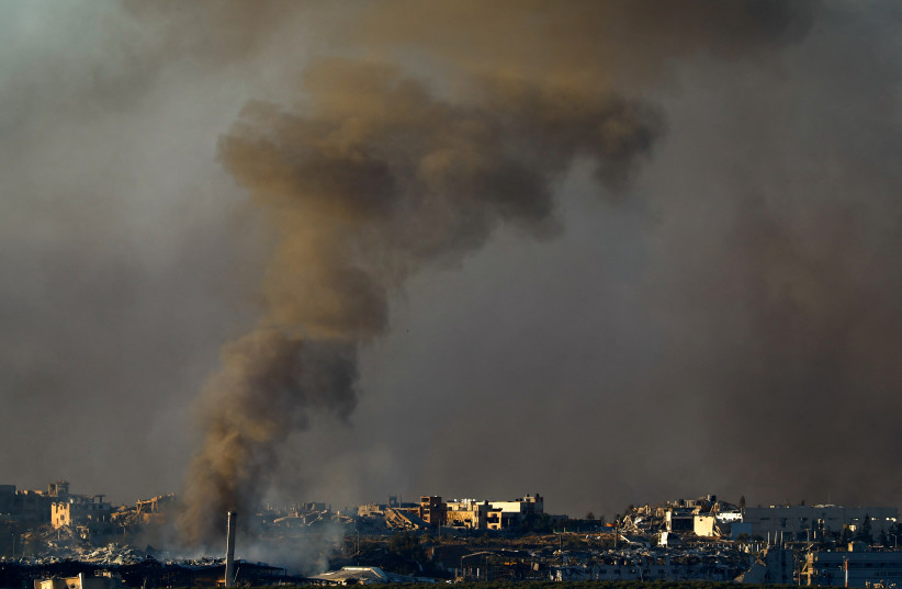 Smoke rises above Gaza, as seen from Southern Israel, December 16, 2023 (credit: REUTERS/CLODAGH KILCOYNE)