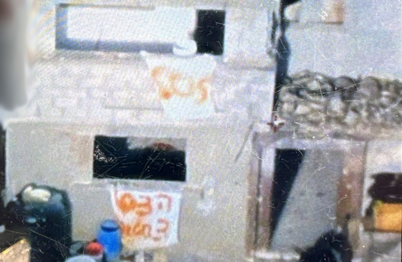 Signs with 'SOS,' and 'help,' seen in the Gaza building where three Israeli hostages were killed on December 15, 2023 (credit: IDF SPOKESPERSON'S UNIT)