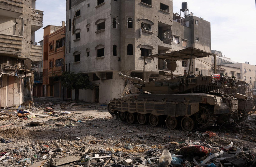  A Merkava tank is seen as Israeli soldiers operate in the Gaza Strip, December 17, 2023 (credit: IDF SPOKESPERSON'S UNIT)