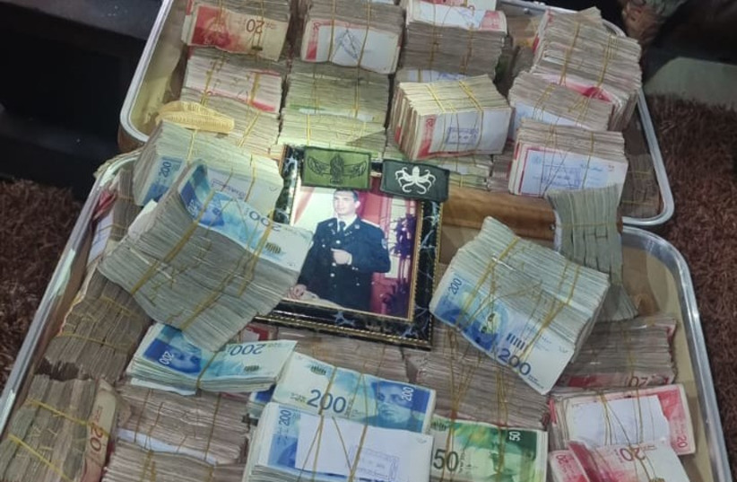  Suitcases of cash found in the home of a senior Hamas member in Gaza. December 18, 2023 (credit: IDF SPOKESPERSON'S UNIT)