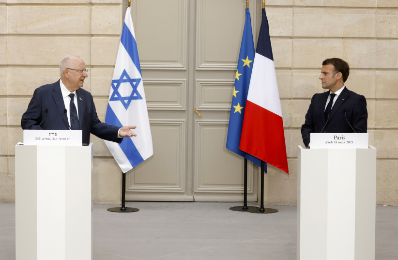 French President Emmanuel Macron and Israeli President Reuven Rivlin attend a joint news conference, at the Elysee Palace in Paris, France March 18, 2021. (credit: LUDOVIC MARIN/POOL VIA REUTERS)