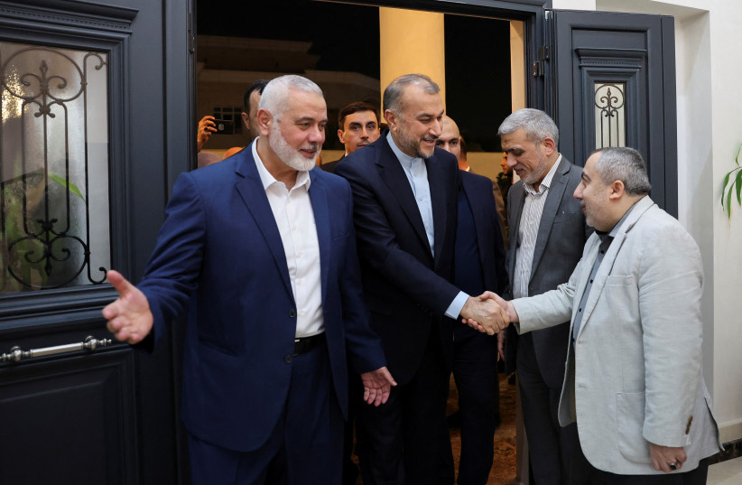  Iran's Foreign Minister Hossein Amir Abdollahian meets with Palestinian group Hamas' top leader, Ismail Haniyeh in Doha, Qatar December 20, 2023.  (credit: IRAN'S FOREIGN MINISTRY/WANA (WEST ASIA NEWS AGENCY)/HANDOUT VIA REUTERS)
