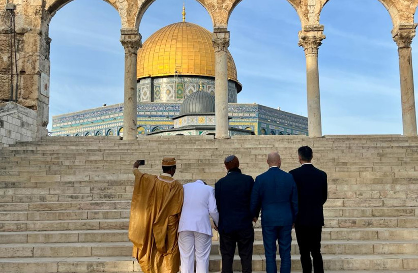   The Africa-Israel Initiative delegation prays on the Temple Mount on December 20, 2023 (credit: MAAYAN HOFFMAN)