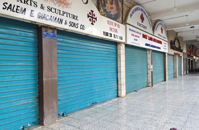  SOUVENIR SHOPS around Manger Square in Bethlehem are shuttered, earlier this month.  (credit: REUTERS/LUCY MARKS)