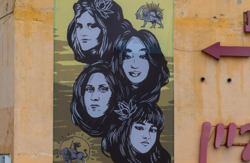 Mural of Mahsa Amini, Sarina Esmailzadeh, Fereshteh Ahmadi, and Nika Shakarami in Jerusalem, unveiled in January 2023. This was the first in a series of murals produced by Iranian American entrepreneur and filmmaker Hooman Khalili. (credit: Courtesy Hooman Khalili Instagram @hoomantv)
