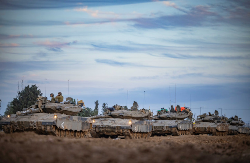  A convoy of Israeli military tanks near the Israeli-Gaza border, southern Israel, November 28, 2023 (credit: YONATAN SINDEL/FLASH 90)