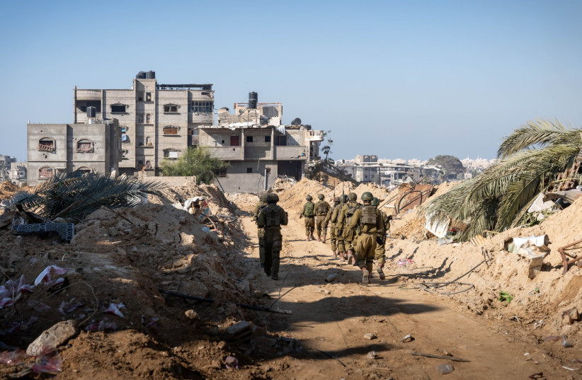 IDF soldiers operate in Gaza's Khan Yunis area on December 21, 2023 (credit: IDF SPOKESPERSON'S UNIT)