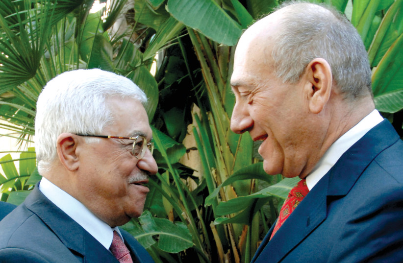  Prime minister Ehud Olmert meets Palestinian President Mahmoud Abbas (left) in Jerusalem on November 17, 2008, in this photograph released by the Government Press Office. (credit: Moshe Milner/GPO)