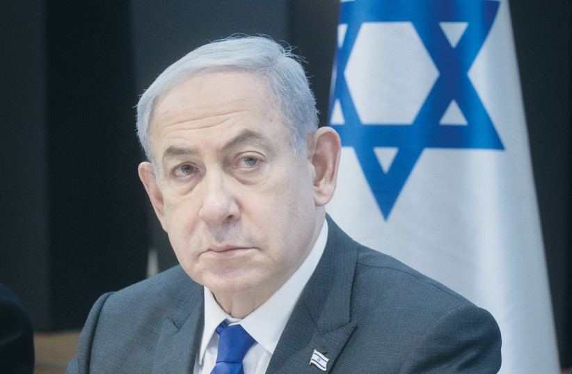  BENJAMIN NETANYAHU leads a cabinet meeting at the Kirya in Tel Aviv, last Sunday. The prime minister has made little secret of his plan to remain in office after the war, the writer notes (credit: MIRIAM ALSTER/FLASH90)