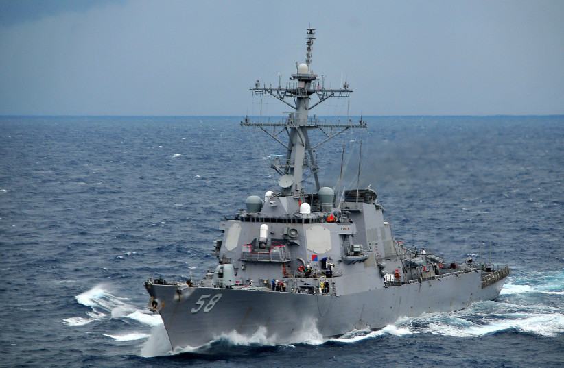 The guided-missile destroyer USS Laboon (DDG 58) pulls alongside the Nimitz-class aircraft carrier USS Carl Vinson (CVN 70) during a refueling-at-sea. February 9, 2010