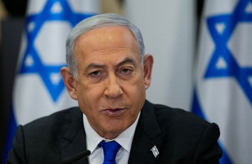Prime Minister Benjamin Netanyahu chairs a cabinet meeting at the Kirya military base, in Tel Aviv, Israel, December 24, 2023 (credit: Ohad Zwigenberg/Pool via REUTERS)