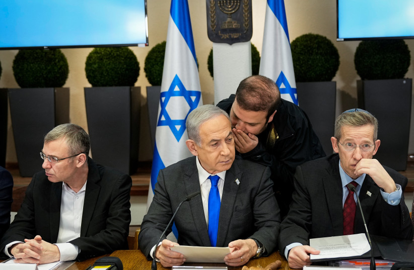 Prime Minister Benjamin Netanyahu chairs a cabinet meeting at the Kirya military base, in Tel Aviv, Israel, December 24, 2023 (credit: Ohad Zwigenberg/Pool via REUTERS)