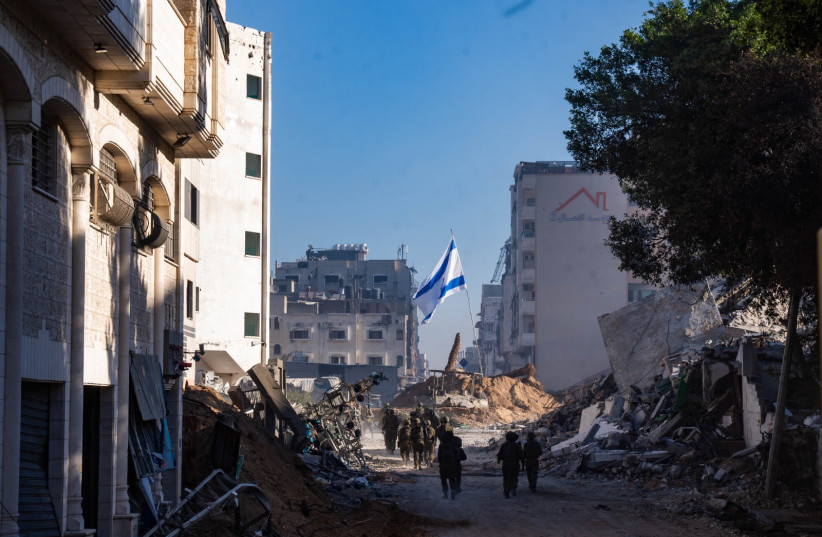  IDF soldiers operate in Gaza City's Sheikh Radwan neighborhood on December 24, 2023 (credit: IDF SPOKESPERSON'S UNIT)