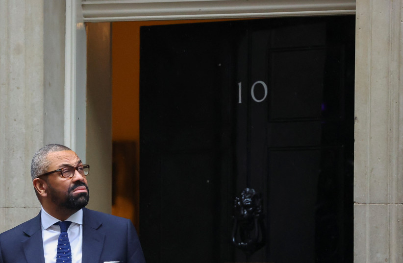  British Home Secretary James Cleverly reacts outside 10 Downing Street in London, Britain, December 19, 2023.  (credit: REUTERS/TOBY MELVILLE)