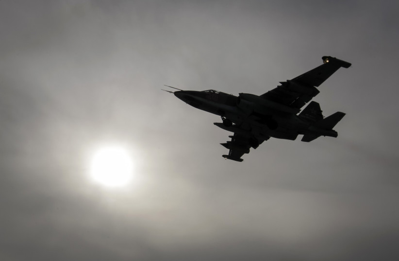  A Sukhoi Su-25 jet fighter flies during a drill at the Russian southern Stavropol region, March 12, 2015. (credit: REUTERS/EDUARD KORNIYENKO )
