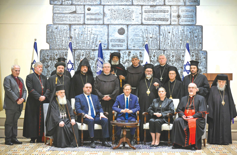  President Isaac Herzog, his wife, Michal, and Interior Minister Moshe Arbel with patriarchs and heads of churches. (credit: KOBI GIDEON/GPO)
