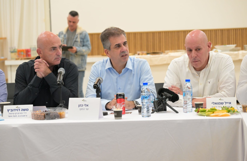  Eli Cohen addresses foreign diplomats about the security situation in Israel's north, December 2023. (credit: Shlomi Amsalem/Foreign Ministry)