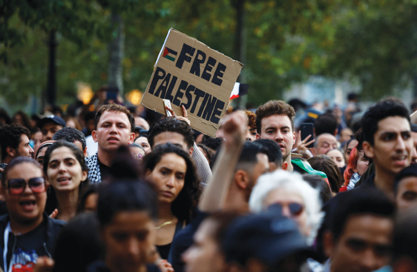  A PROTESTER holds a ‘Free Palestine’ placard during a demonstration in Paris, in October (credit: Sarah Meyssonnier/Reuters)
